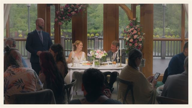 The top table at the reception, seen through a window
